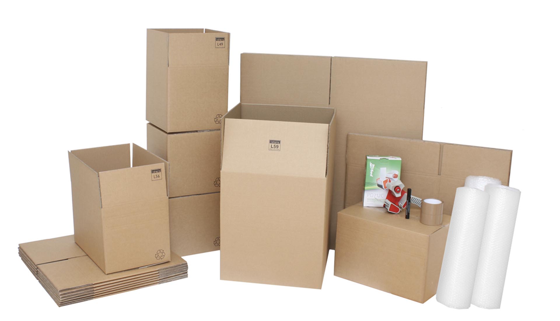 A variety of cardboard boxes, bubble wrap, and packing tape showcasing the best packaging materials supplier in the UK.